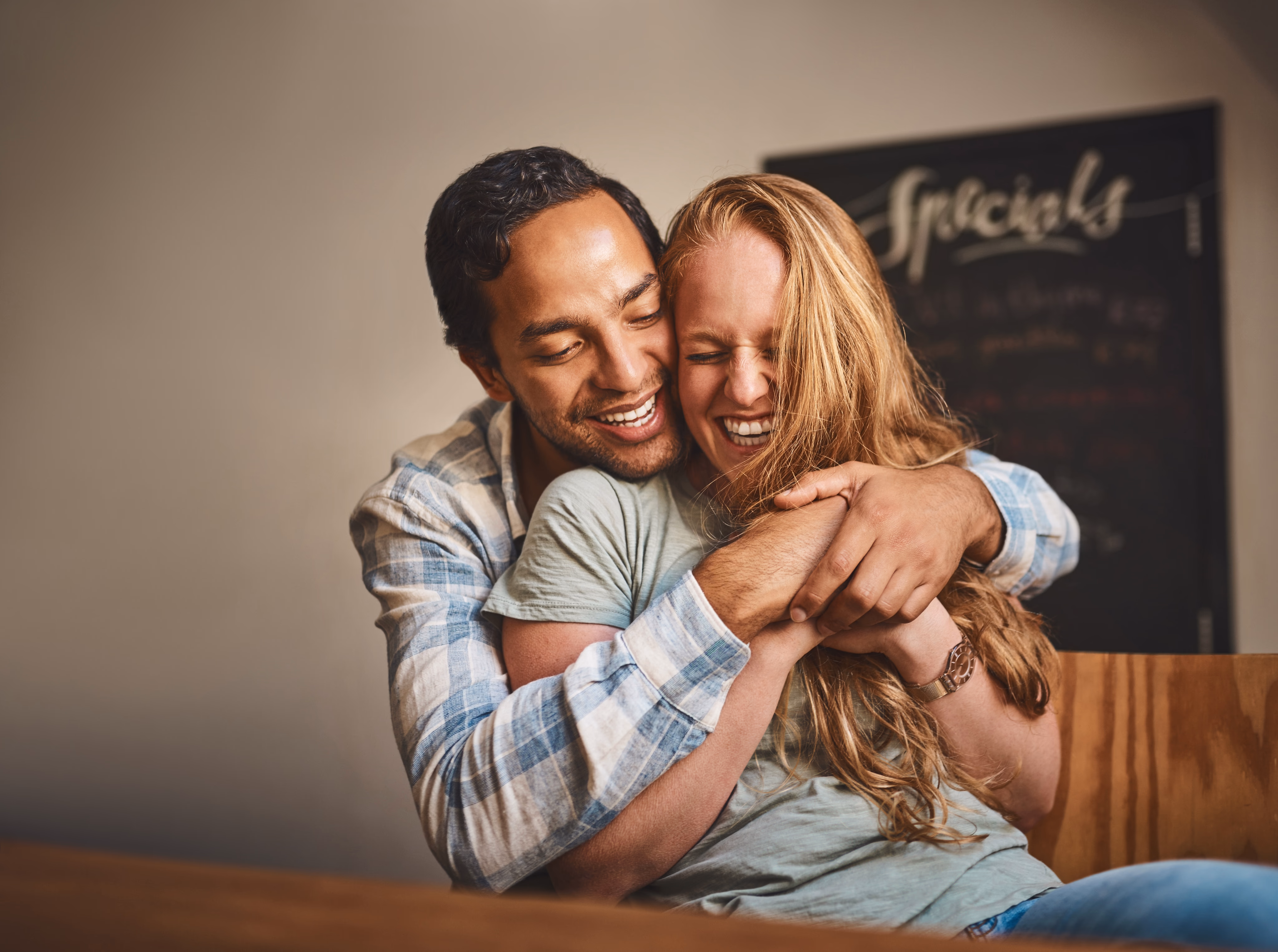 Happy couple in their restored home